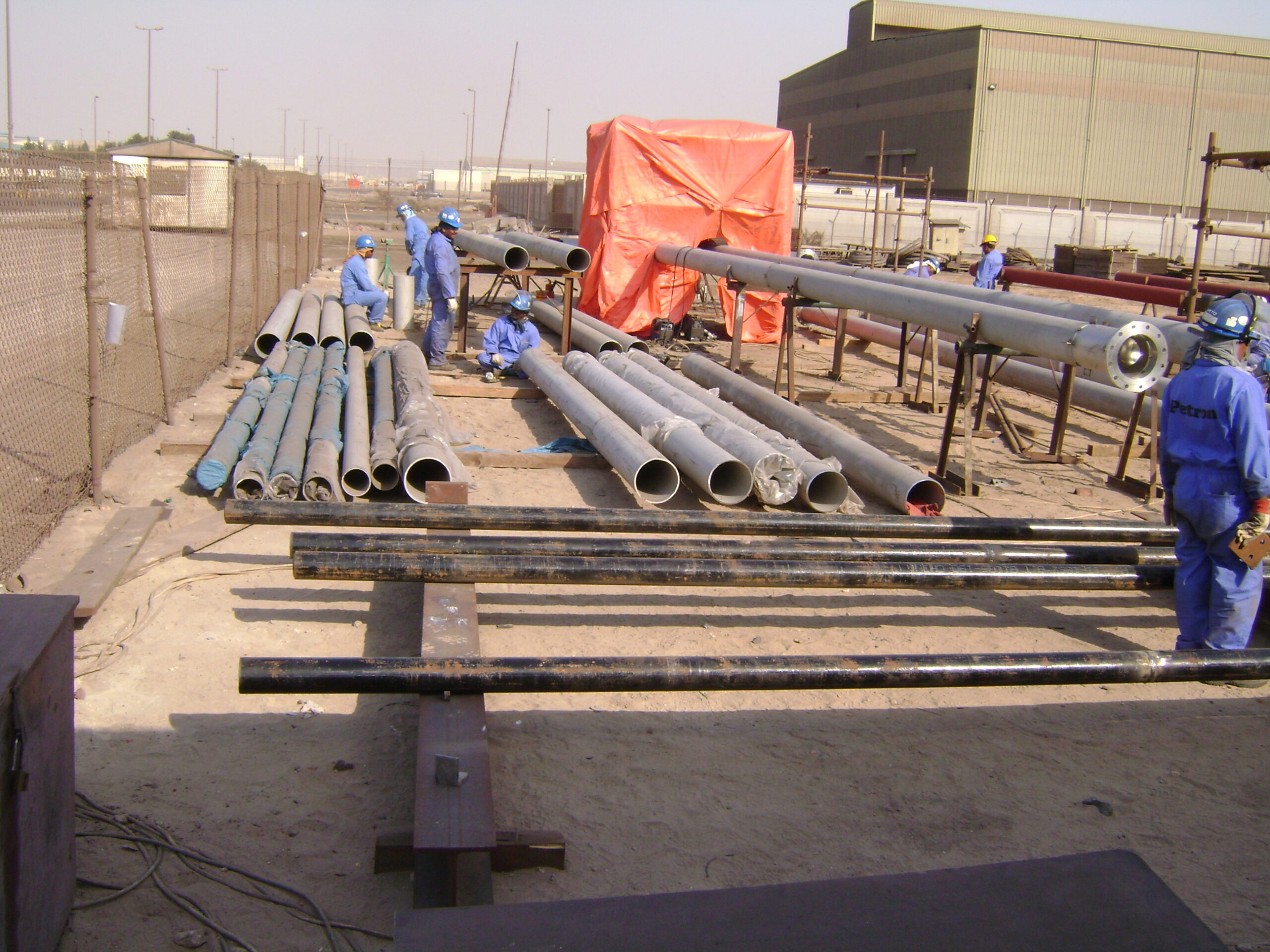 Piping fabrication work at an industrial site